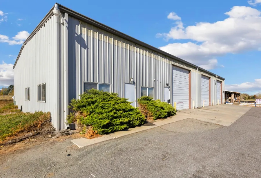 Metal commercial building with roll-up doors in Leander, Texas