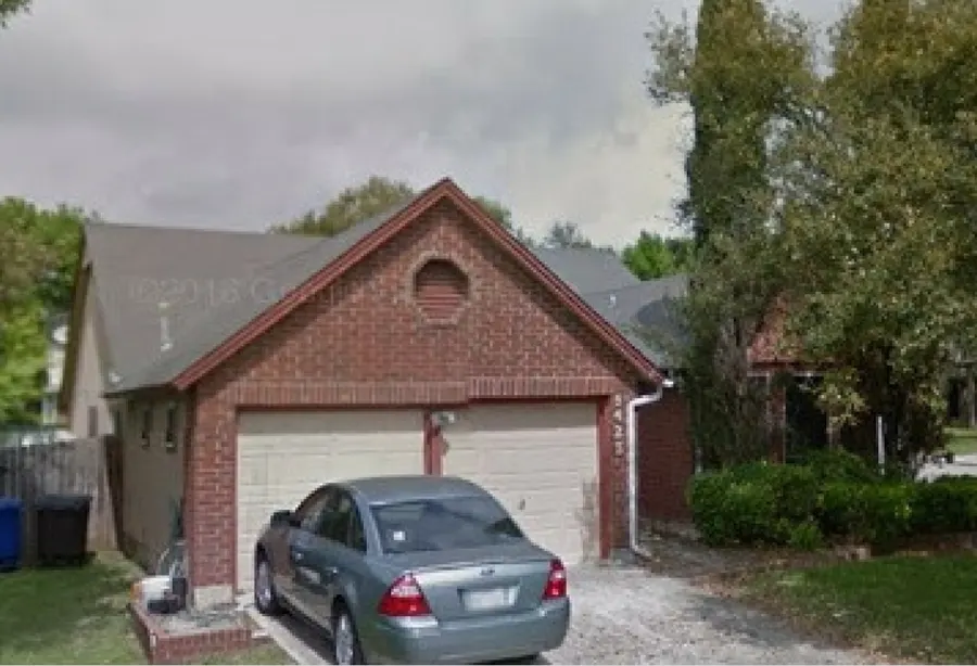 Brick investment home with garage in San Antonio, Texas